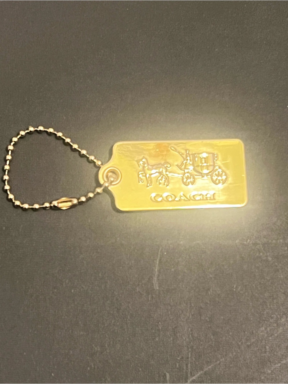 Rare Vintage Coach Gold Tone Embossed Horse & Carriage Dog-Tag Key Holder